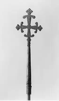 A cross staff with an elaborate geometric design for the cross