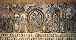 Buddha flanked by bodhisattvas with flying apsaras. Dunhuang mural. Cave 428, Northern Zhou dynasty