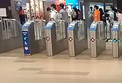 Fare gates of the Downtown Line concourse at Bukit Panjang MRT/LRT station