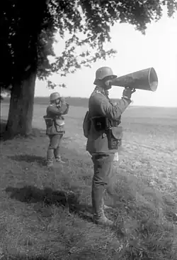 German soldier using a megaphone to command troops, 1930