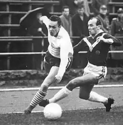 Fuchs (left) in a duel with Wolfgang Pfeifer of SG Dynamo Dresden (right) during the match between SC Dynamo Berlin and SG Dynamo Dresden at the Dynamo-Stadion im Sportforum on 25 November 1964.