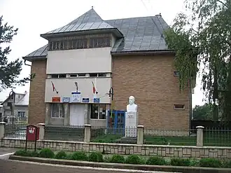 Community center, with bust of Emil Bodnăraș