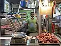 Butcher at Tekka Centre wet market, Singapore