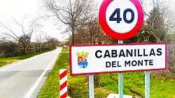 Name of the town on the sign indicating the entrance to the urbanized area