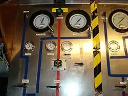Wet bell supply gas panel (left)