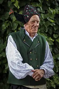 An old man in traditional attire