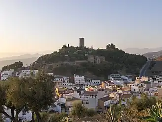 View of Vélez-Málaga, with a castle on top of a hill