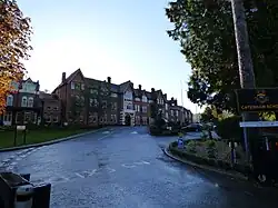 The front of Caterham in 2014 from Harestone Valley Road.