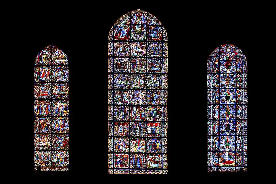 Lancet windows under the west rose window; the Jesse Window or genealogy of Christ (right); Life of Christ (center), and the Passion of Christ (left)