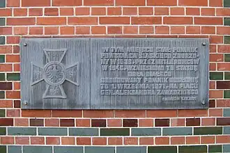 Commemorative plaque on the northeast façade (2018)