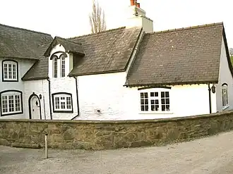 Brick extension with dormer to SW