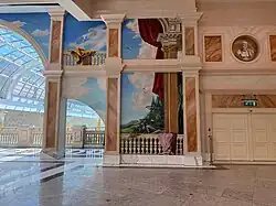 A trompe l'oeil at second floor level