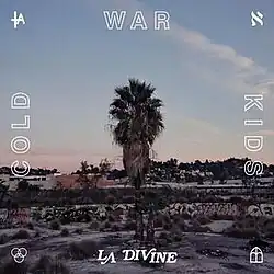 The cover consists of a palm tree in a suburban neighborhood during sunset. One word from the band is on each side of the cover.