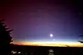 The tail of the comet Comet McNaught was still seen in the Northern hemisphere after the comet itself was long gone. The picture also shows the Moon and Venus.