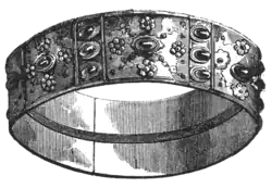 A black and white illustration of an oval crown