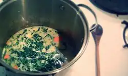 Cream of spinach soup being cooked