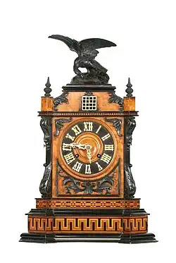 A neo-Baroque spring driven, mantel clock, attributed to Johann Baptist Beha, c. 1885. Original door missing (Deutsches Uhrenmuseum, Inv. 15–3833)