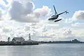 Helicopter taking off in front of Cunningham Pier