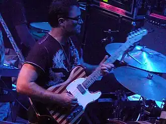 Sitek performing with TV on the Radio at the 9:30 Club in 2009