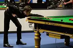 photo of David Gilbert playing a snooker shot