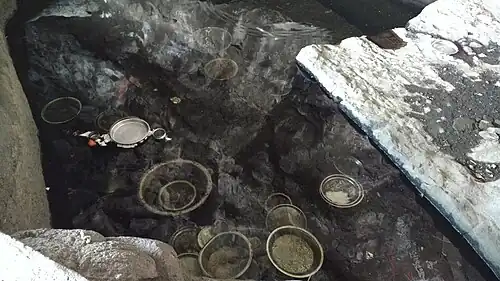 The utensils dipped in water