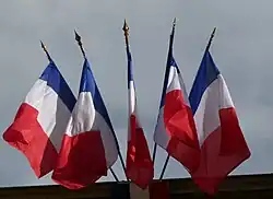 Multiple French flags as commonly flown from public buildings