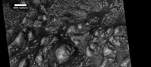 Layers in Firsoff Crater, as seen by HiRISE under HiWish program. Note: this image field can be found in the previous image of the layers in Firsoff Crater, as seen by CTX camera (on Mars Reconnaissance Orbiter).