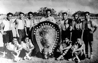 Photograph of the Pancha Pandavas with the IFA Shield