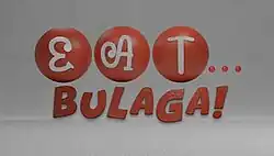 An image with a gray background. The show title is displayed on the center of the image.