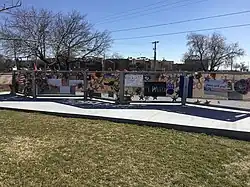 A memorial wall made to commence the victims of the Walmart shooting