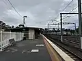 Southbound view from Platform 2, with two X'Trapolis trains seen sitting in the station sidings, August 2024