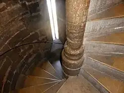 a photo of a spiral staircase looking down