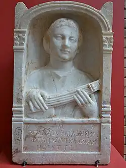 Memorial stele for a 16-year-old Roman woman, shown playing a pandurium, 2nd century AD, from Emerita Augusta, Hispania (Museo Nacional de Arte Romano, Mérida, Spain)[11][12][13]