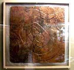 Ogee motif-repousse copper plate from the Etowah Site