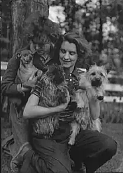 Eva Le Gallienne and unidentified woman (Marion Morgan?), with dogs (1937)