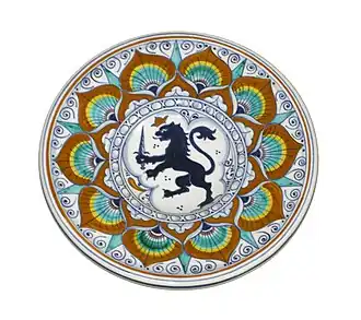 Plate decorated in the so-called "Peacock Feather" style