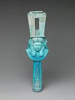 Ancient Egyptian sistrum with a Hathor mascaron, c.305–282 BC, faience, Metropolitan Museum of Art