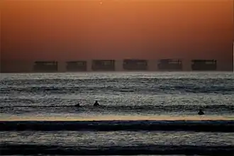 Superimposed detail from six frames of a view showing how the miraged image of a ship changes from one moment to the next