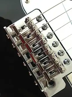 Six-point "tremolo" bridge