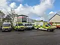 Fleet of St John vehicles at Midleton Fire Station assisting in the evacuation of Midleton Hospital during Storm Babet in October 2023.
