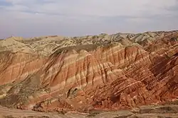 Rock hills with red and white stripes