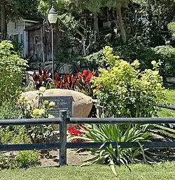 A small decorative flower garden is seen near the main entrance to the Paso Robles Event Center complex during the summer of 2023.