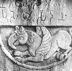 Griffin with Brahmi script inscription.