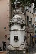 Fontaine de la place des Tanneurs, Aix-en -Provence. (1761). By the sculptor Chastel. It was rebuilt in 1861. The urn on top is from the original version.