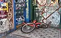 Vandalised facade and bicycle in Hamburg