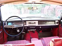 1974 Volga interior – "silver" finished dashboard, central armrest, aftermarket "NORMA" safety belts
