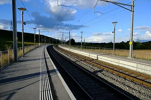 Side platforms next to double-track railway line