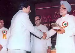 Ghanshyam Sarda receiving award from the Prime Minister of India