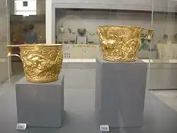 The Vaphio Cups; 1675-1410 BC; gold; height: 7.8 cm, diameter: 10.7 cm; from Vaphio (Laconia, Greece); National Archaeological Museum (Athens)[11]