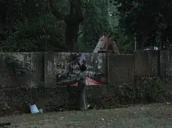 Graffiti application in India using natural pigments (mostly charcoal, plant saps, and dirt)